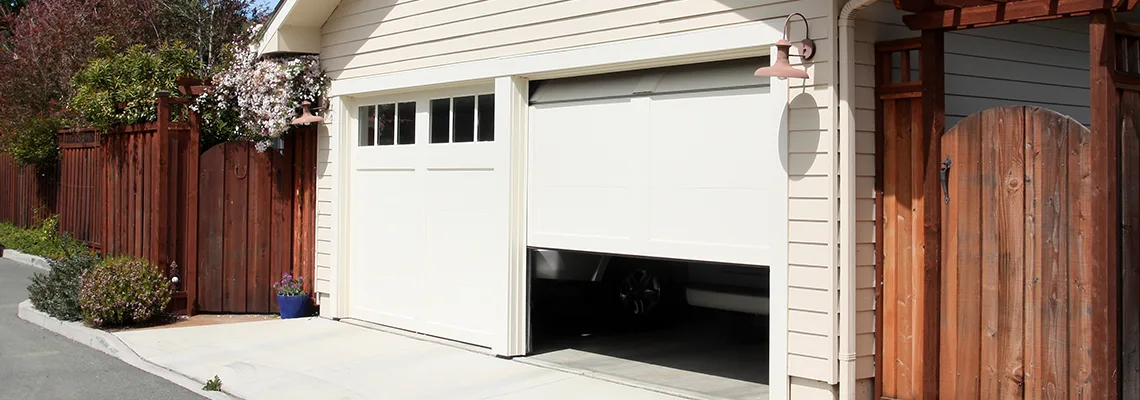 Fix Metal Garage Door Jerking in Ocoee, Florida